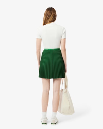 에센셜 숏 플리츠 스커트