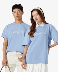 라코스테 X 고질라 모스라 라바 티셔츠