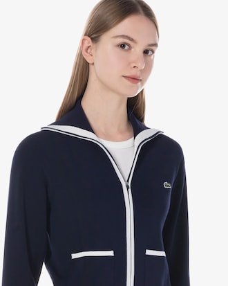 컬러티핑 윙카라 집업 스웨터