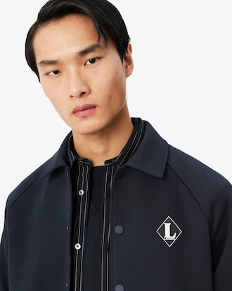 L 뱃지 래글런 소매 카라 스웻 점퍼