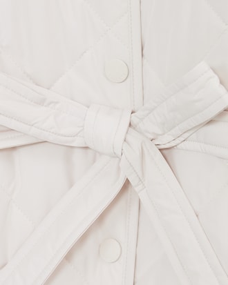 울배색 벨티드 퀼팅 점퍼