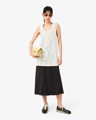 메쉬 슬리브리스 스웨터