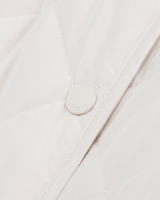 울배색 벨티드 퀼팅 점퍼