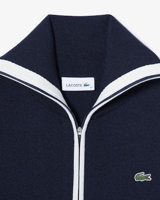 컬러티핑 윙카라 집업 스웨터